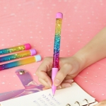 Bolígrafos de arcoiris y brillantes