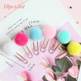 Pack de 10 clips con un pompón de colores