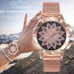 Reloj de color oro rosa con una flor geométrica